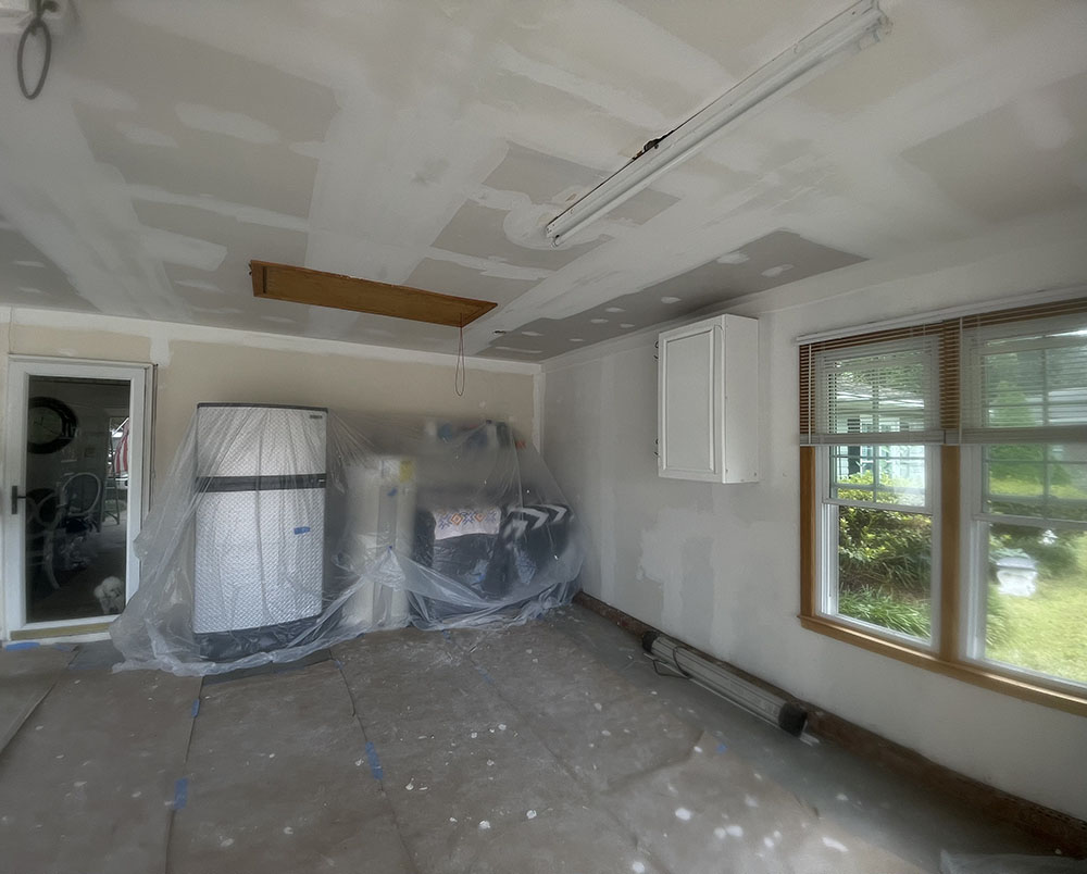 Ceiling drywall joints taped, mudded, and floated flat